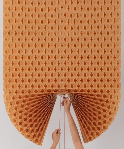 paper blinds by natchar sawatdichai employ a mechanism that allows you to adjust their shape