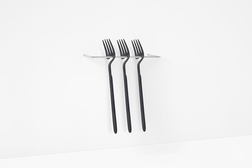 nendo's skeleton collection features cutlery you can hook onto walls and cups