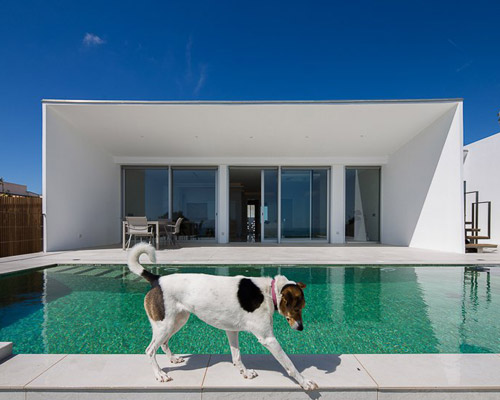 portuguese coast villa by CORE architects overlooks the ocean