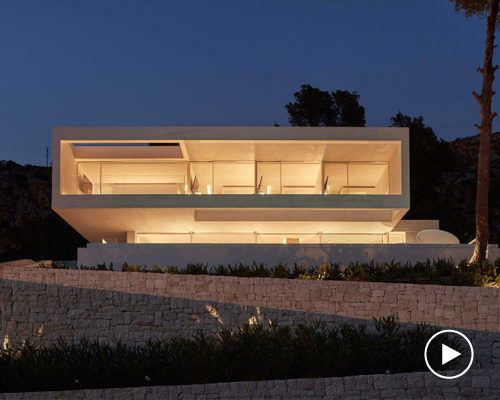 all-white 'oslo house' by ramón esteve overlooks the mediterranean sea