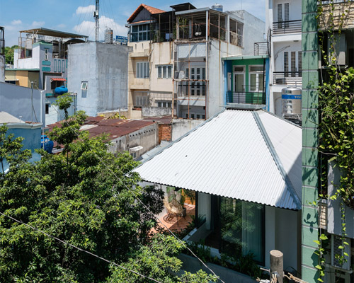 AD+studio renovates saigon alley house with references to the image of an umbrella