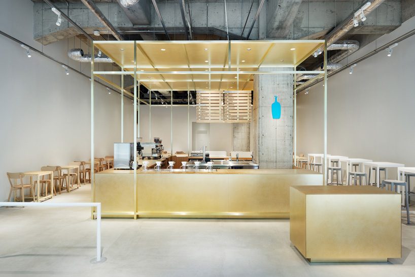 Schemata Focuses Design For First Blue Bottle Cafe In Kobe Around A Central Brass Structure