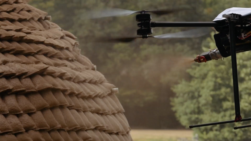 mud shell mud-spraying drones that build new homes could spell future for city housing