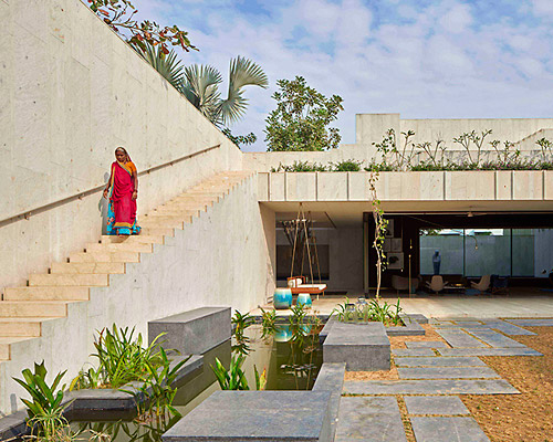 sandstone house in ahmedabad, india, by SPASM features secret gardens