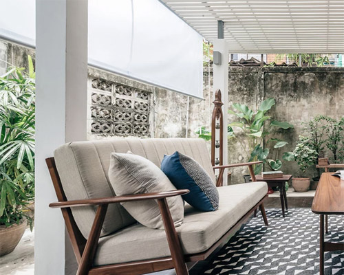 architect transforms old thai storage into a light-filled, green oasis