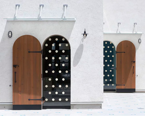 gabled roofs and a dotted pathway add homelike feel to organic design's commercial building