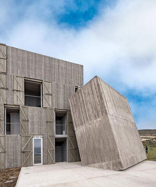 alejandro aravena's 'primitive' concrete home in chile hides interiors of subtle luxury