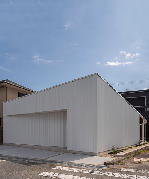 arbol's family house in takarazuka is covered with corrugated aluminum