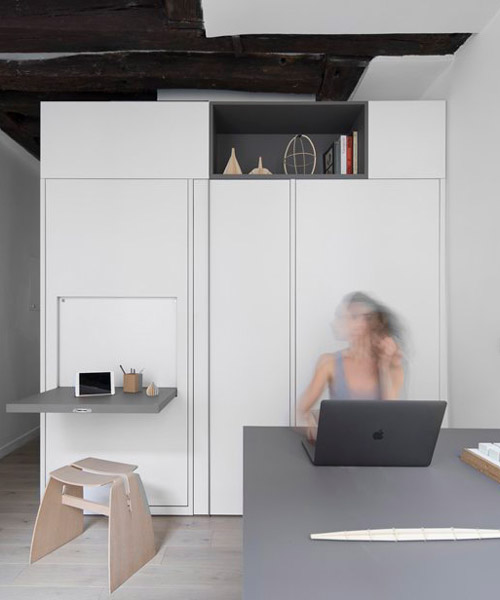 this minimal 16 sqm apartment in paris seamlessly turns into a workspace