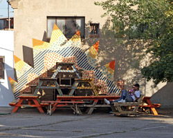 ENORME studio builds a colorful pyramide for picnic in zaragoza, spain