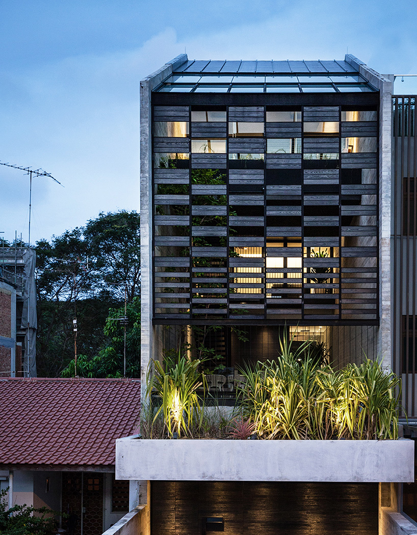 formwerkz incorporates nature in singapore residence through porous layout