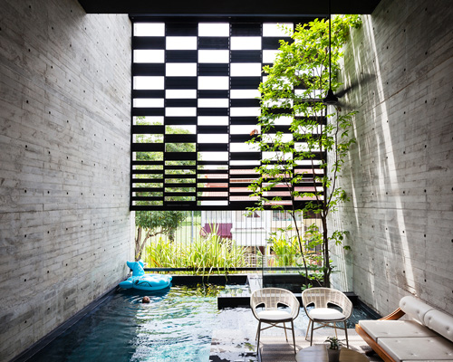 formwerkz incorporates nature seamlessly in singapore residence through porous layout