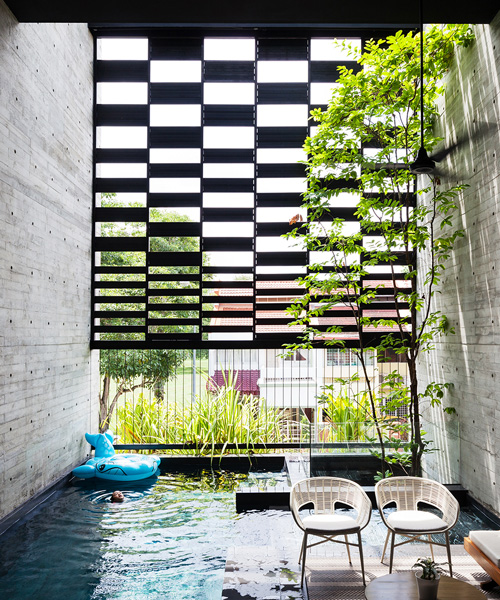 formwerkz incorporates nature seamlessly in singapore residence through porous layout
