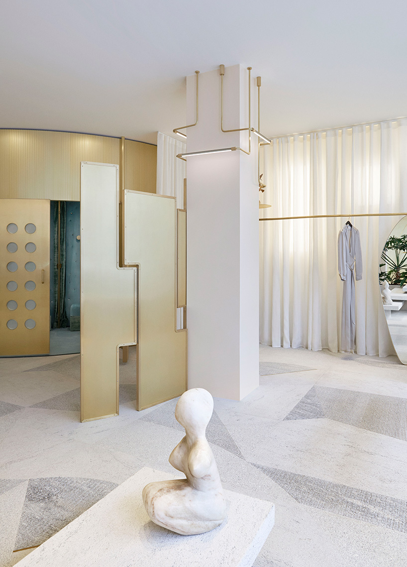 pink onyx, granite and brass take center stage at the forte forte boutique in paris