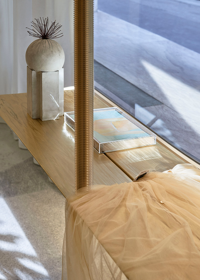 pink onyx, granite and brass take center stage at the forte forte boutique in paris