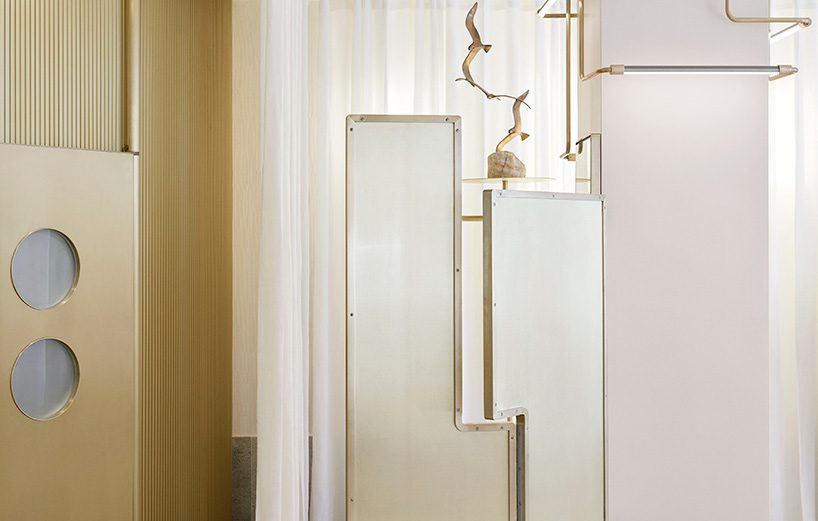 pink onyx, granite and brass take center stage at the forte forte boutique in paris
