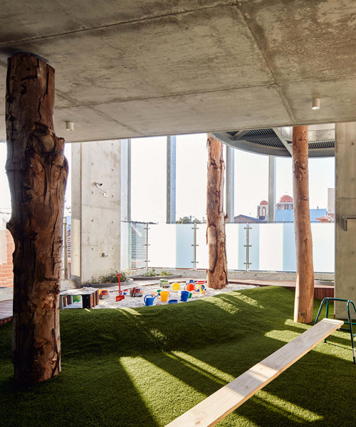 trees grow in this high-rise childcare center, by tom godden + matthew crawford architects