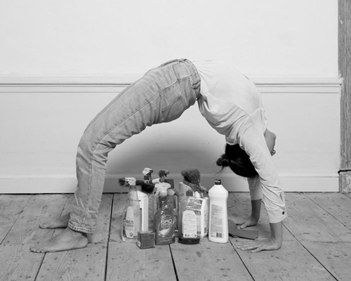 artist csilla klenyánszki reflects on the housework gender gap through ironic yoga sequence