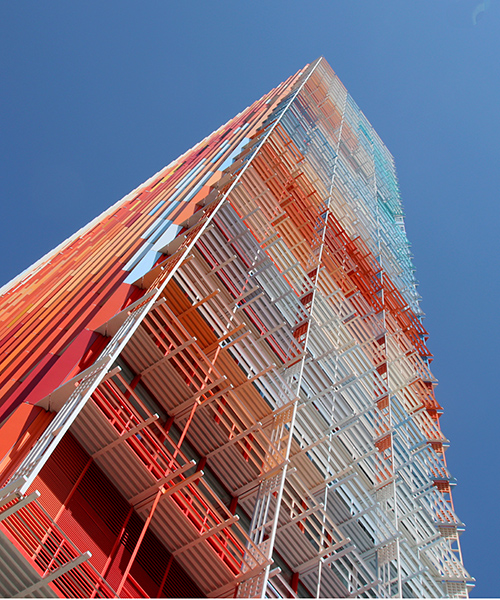 atelier jean nouvel honors marseille with office tower in shades of blue, white, and red