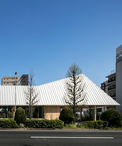 kengo kuma tops banquet hall in nagoya with an elongated roof canopy