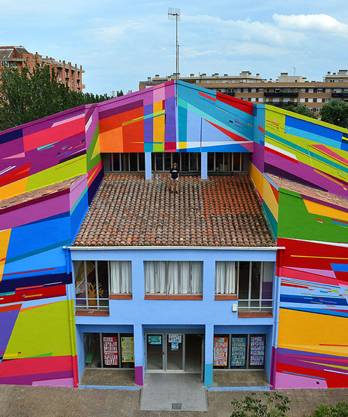 an elementary school façade in spain becomes a radical representation of electronic music