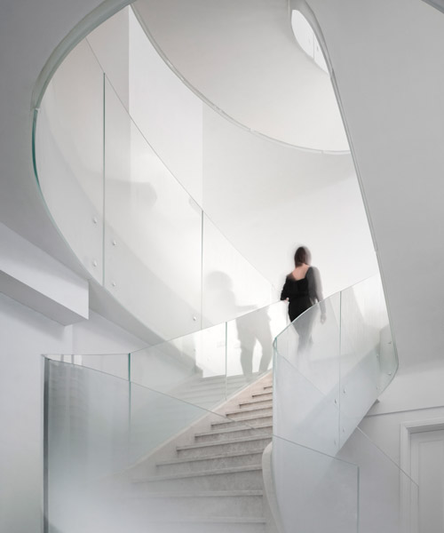 kos + zerebecky design a cloud-like staircase for this villa in shanghai