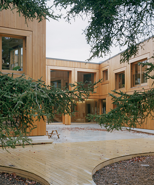 lacroix chessex architectes envelops the landscape with nursery in switzerland