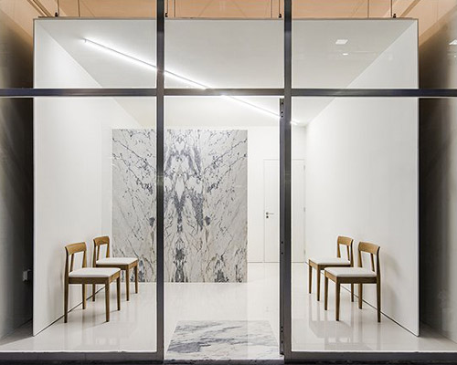 subtle marble lines define the layout of this medical center in braga, by martins architecture