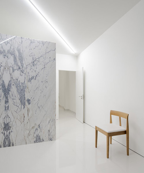 subtle marble lines define the layout of this medical center in braga, by martins architecture