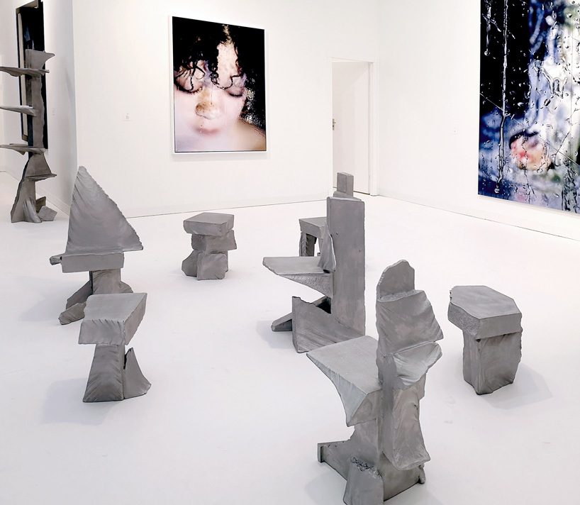 max lamb carves ‘prehistoric' objects from polystyrene then coats them with aluminum paint