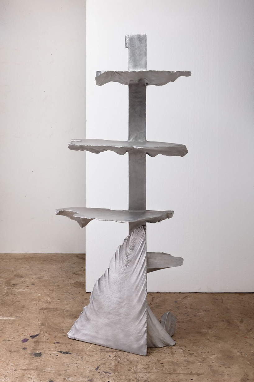 max lamb carves ‘prehistoric' objects from polystyrene then coats them with aluminum paint