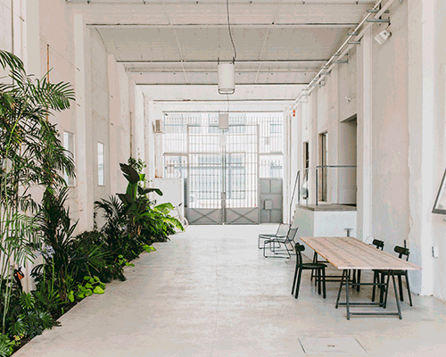 an industrial warehouse in barcelona is transformed into coworking creative space 'montoya'