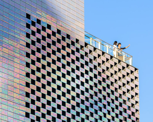 MVRDV wraps its beijing M·CUBE in subtly iridescent ceramic tilework