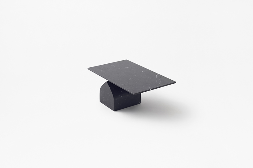 nendo's seesaw tables for marsotto edizioni softly rise up from the base designboom