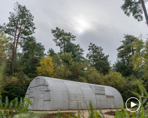 artist rachel whiteread sculpts cast concrete version of a nissen hut in UK forest