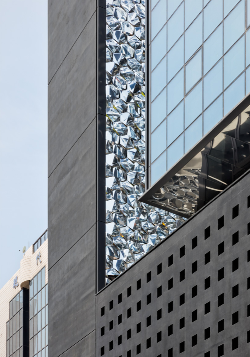 OBBA juxtaposes reflective panels with concrete for office tower in seoul