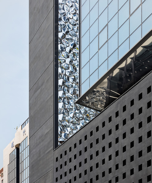 OBBA juxtaposes reflective metal panels with dark concrete for office tower in seoul