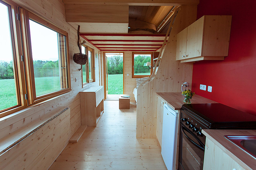 optinid s tiny house features a sliding roof that opens to 