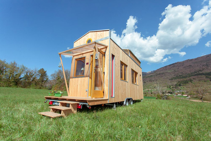 optinid s tiny  house  features a sliding roof  that opens to 