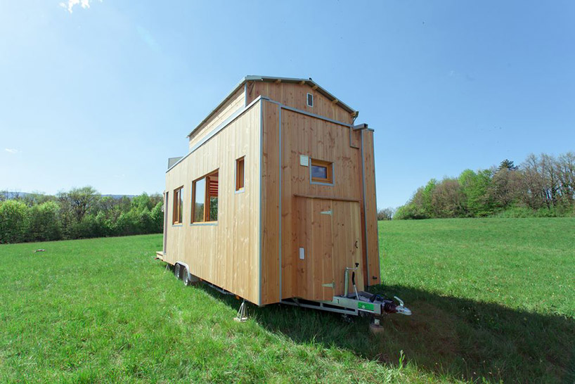 optinid s tiny house features a sliding roof that opens to 