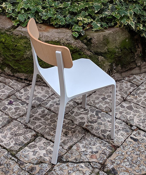 ruelle chair by philippe tabet combines cast alumnum with plywood