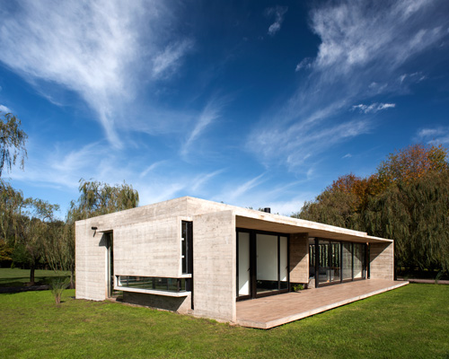 luciano kruk applies trademark concrete finish in buenos aires residence