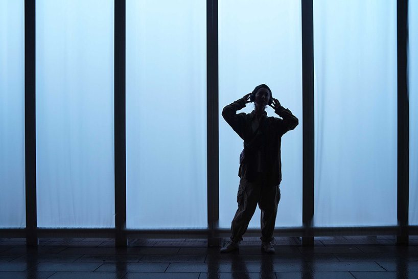 superimpose wraps beijing's CO2 pavilion in translucent screens and smoke