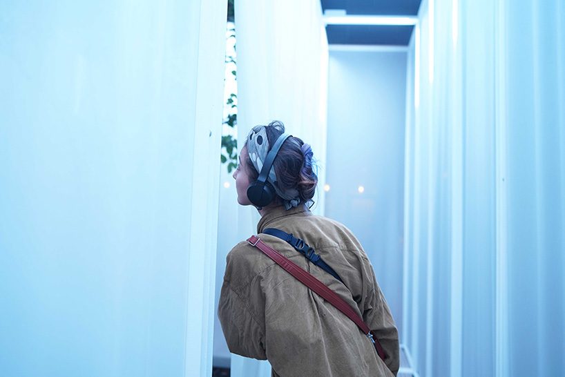 superimpose wraps beijing's CO2 pavilion in translucent screens and smoke