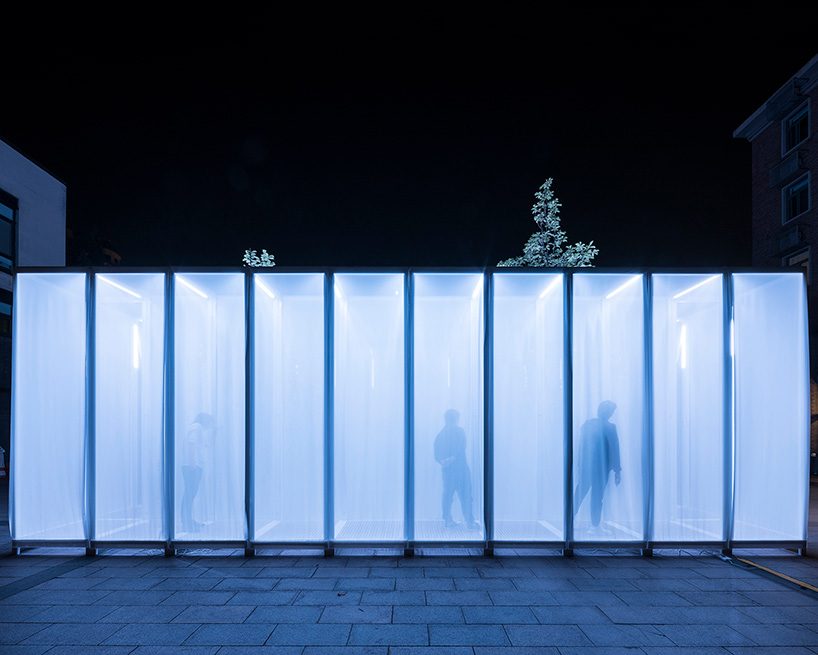 superimpose wraps beijing's CO2 pavilion in translucent screens and smoke
