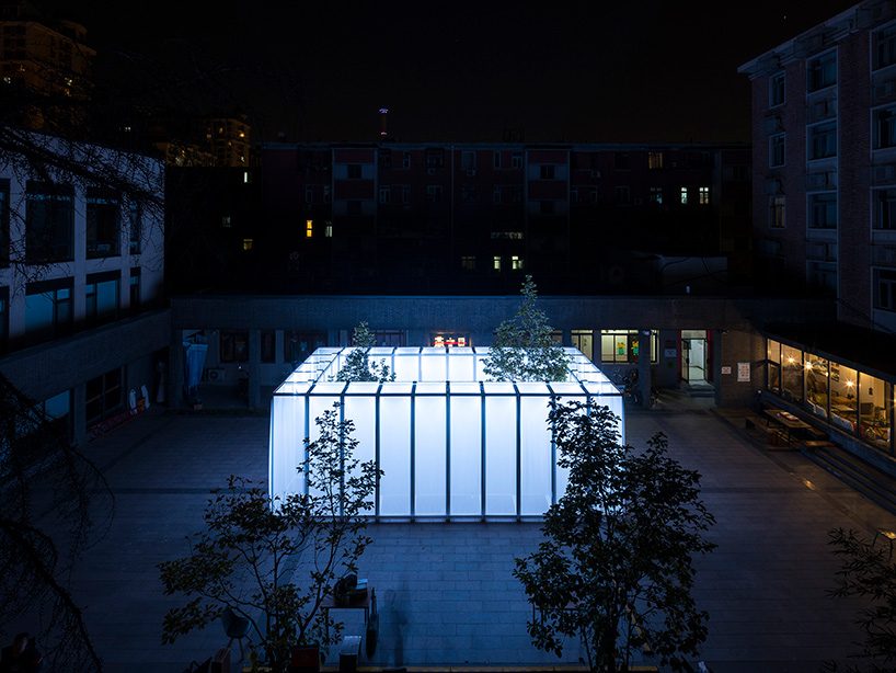 superimpose wraps beijing's CO2 pavilion in translucent white screens and smoke