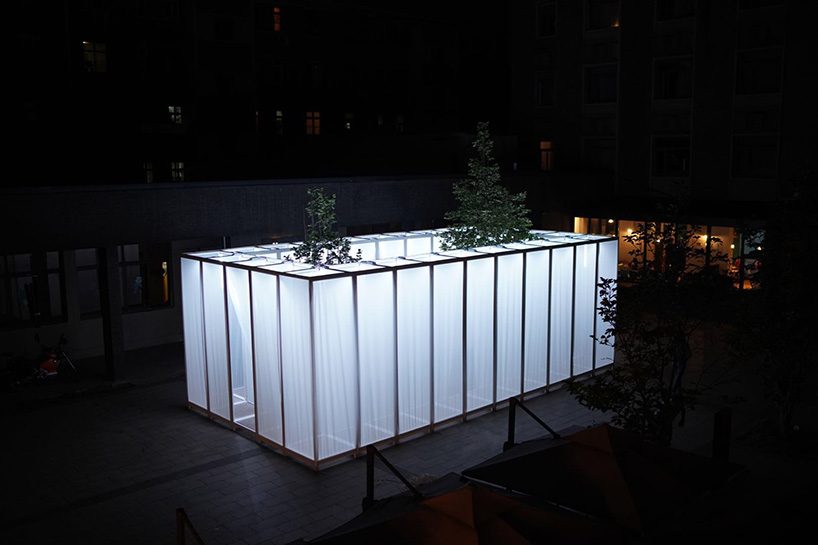 superimpose wraps beijing's CO2 pavilion in translucent screens and smoke