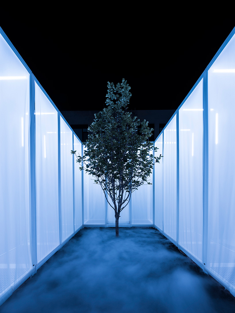 superimpose wraps beijing's CO2 pavilion in translucent white screens and smoke