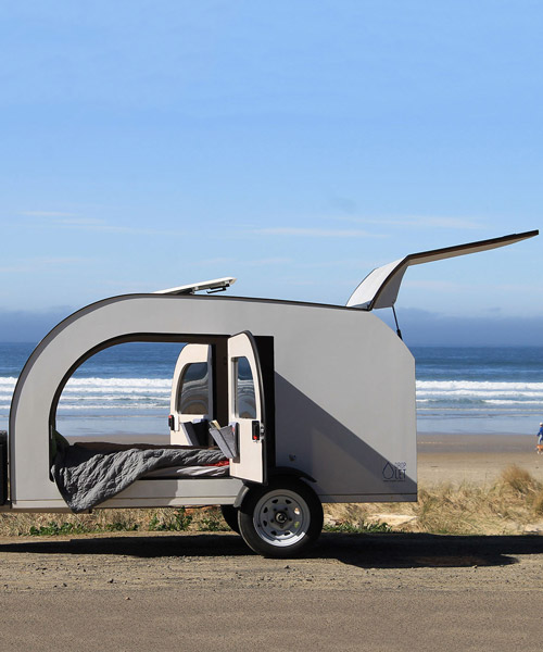 this tiny teardrop trailer fits a queen size bed and fully equipped kitchen
