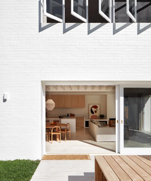 those architects links rooms and courtyards through breezway in 1980s bungalow renovation